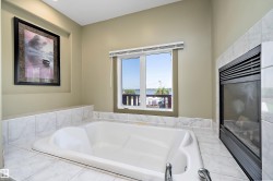 Full bathroom featuring a bath - 