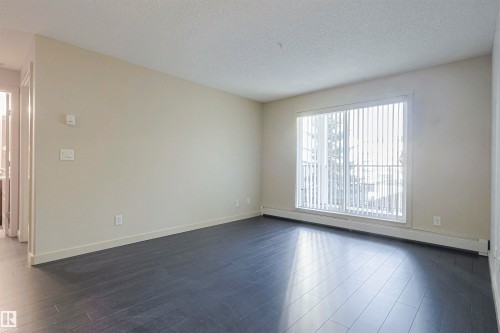 230 6076 Schonsee Way Nw, Edmonton, AB - Indoor Photo Showing Other Room