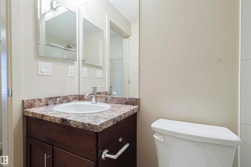 230 6076 Schonsee Way Nw, Edmonton, AB - Indoor Photo Showing Bathroom