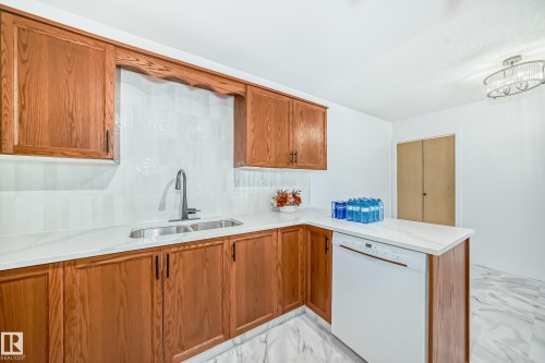 15571 59A Street, Edmonton, AB - Indoor Photo Showing Kitchen With Double Sink