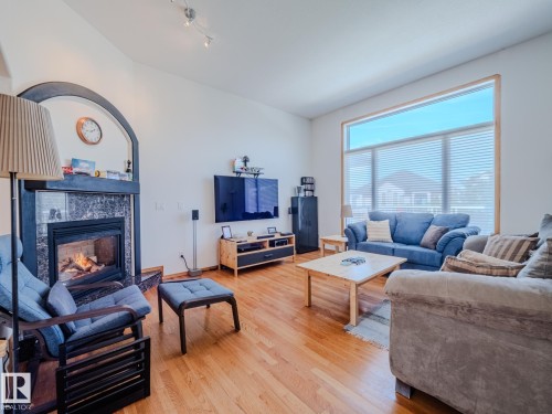 7824 165 Avenue, Edmonton, AB - Indoor Photo Showing Living Room With Fireplace