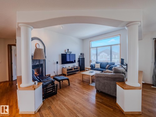 7824 165 Avenue, Edmonton, AB - Indoor Photo Showing Living Room With Fireplace