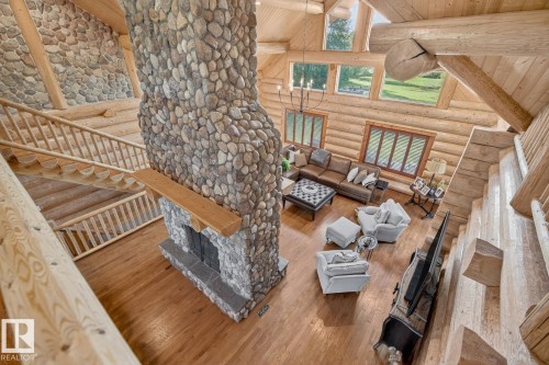 16 52111 Rge Road 25, Rural Parkland County, AB - Indoor Photo Showing Other Room With Fireplace