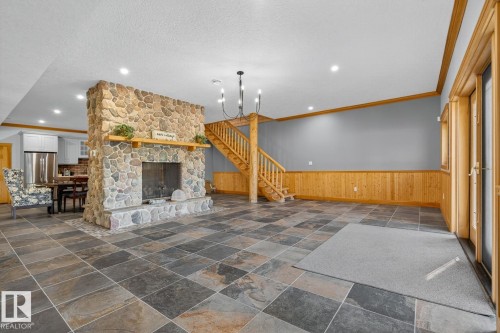 16 52111 Rge Road 25, Rural Parkland County, AB - Indoor Photo Showing Other Room With Fireplace