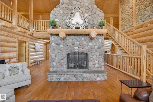 16 52111 Rge Road 25, Rural Parkland County, AB - Indoor Photo Showing Living Room With Fireplace