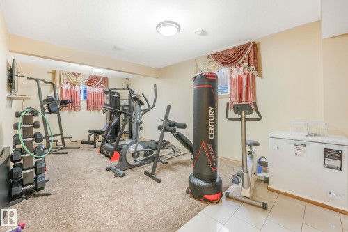 1238 Secord Landing Landing, Edmonton, AB - Indoor Photo Showing Gym Room