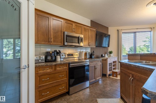 9 Southbridge Crescent, Calmar, AB - Indoor Photo Showing Kitchen With Double Sink