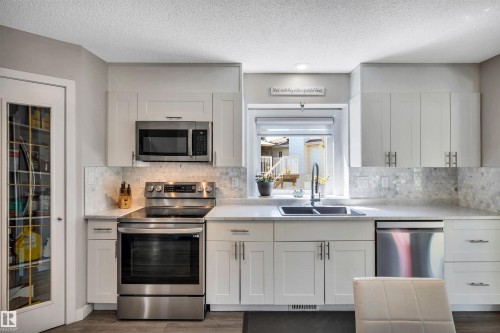 78 Deer Park Boulevard, Spruce Grove, AB - Indoor Photo Showing Kitchen With Stainless Steel Kitchen With Double Sink