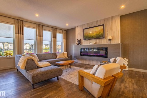 6013 Naden Landing Landing, Edmonton, AB - Indoor Photo Showing Living Room With Fireplace