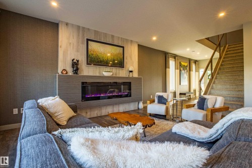 6013 Naden Landing Landing, Edmonton, AB - Indoor Photo Showing Living Room With Fireplace