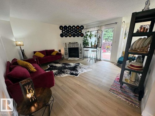 2419 142 Avenue, Edmonton, AB - Indoor Photo Showing Living Room With Fireplace