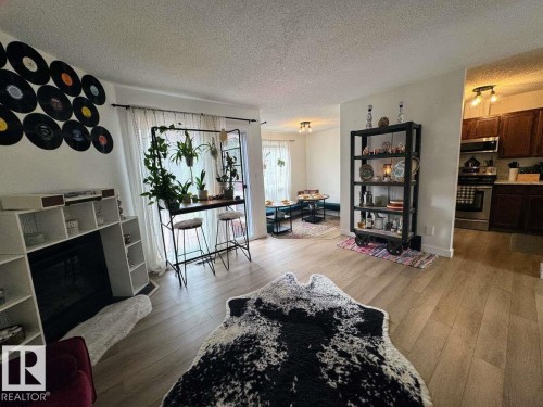 2419 142 Avenue, Edmonton, AB - Indoor Photo Showing Living Room With Fireplace