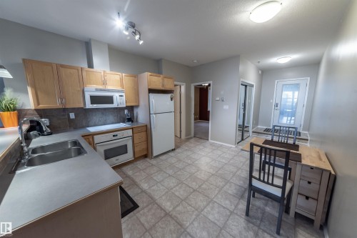 150 4827 104A Street, Edmonton, AB - Indoor Photo Showing Kitchen With Double Sink