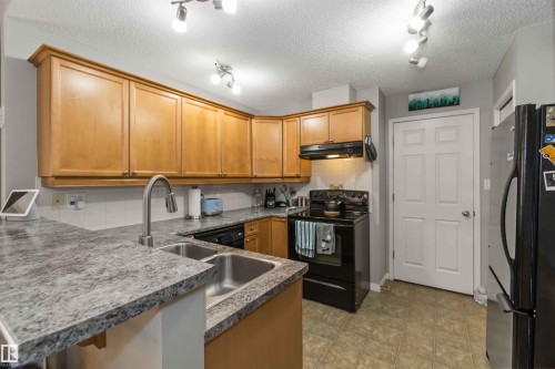 8A 79 Bellerose Drive, St. Albert, AB - Indoor Photo Showing Kitchen With Double Sink
