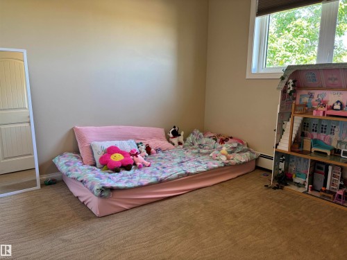 4804 53 Avenue, Elk Point, AB - Indoor Photo Showing Bedroom