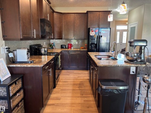 4804 53 Avenue, Elk Point, AB - Indoor Photo Showing Kitchen With Double Sink