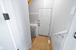 Entryway featuring wood finished floors - 