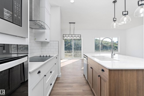 4511 Warbler Loop, Edmonton, AB - Indoor Photo Showing Kitchen With Upgraded Kitchen