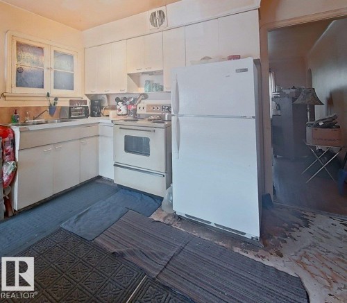11345 93 Street, Edmonton, AB - Indoor Photo Showing Kitchen With Double Sink