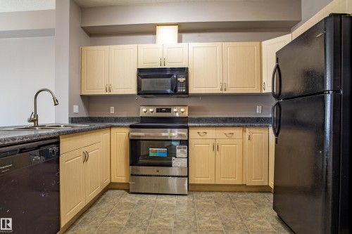 326 4304 139 Avenue, Edmonton, AB - Indoor Photo Showing Kitchen With Stainless Steel Kitchen With Double Sink