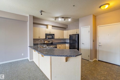 326 4304 139 Avenue, Edmonton, AB - Indoor Photo Showing Kitchen With Double Sink
