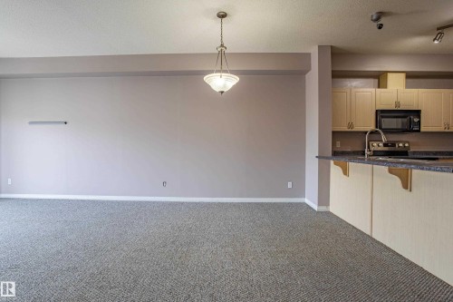326 4304 139 Avenue, Edmonton, AB - Indoor Photo Showing Kitchen With Double Sink