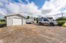 Detached garage featuring driveway - 4702 50 Avenue, Cold Lake, AB  - Outdoor 