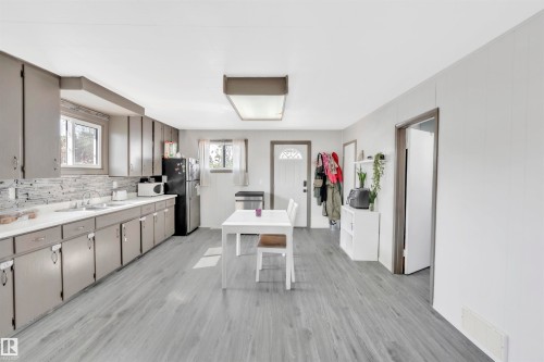 4702 50 Avenue, Cold Lake, AB - Indoor Photo Showing Kitchen With Double Sink