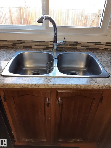 1068 Lakewood Road N, Edmonton, AB - Indoor Photo Showing Kitchen With Double Sink