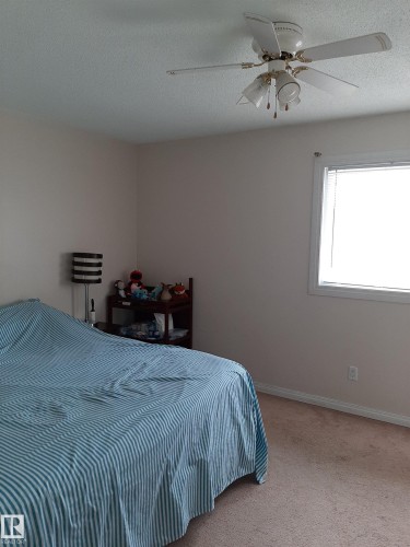 1068 Lakewood Road N, Edmonton, AB - Indoor Photo Showing Bedroom