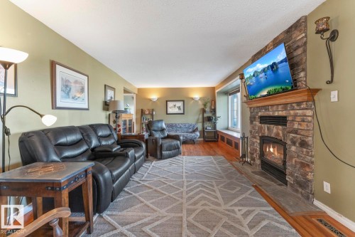 20-62320 Rge Rd 411A, Rural Bonnyville M.D., AB - Indoor Photo Showing Living Room With Fireplace