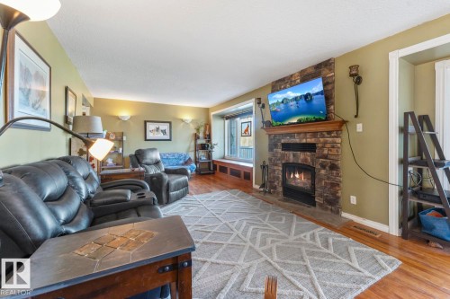 20-62320 Rge Rd 411A, Rural Bonnyville M.D., AB - Indoor Photo Showing Living Room With Fireplace