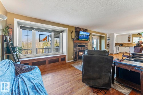 20-62320 Rge Rd 411A, Rural Bonnyville M.D., AB - Indoor Photo Showing Living Room With Fireplace