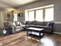166 West Liberty Crescent, Millet, AB  - Indoor Photo Showing Living Room 