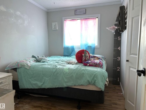 166 West Liberty Crescent, Millet, AB - Indoor Photo Showing Bedroom