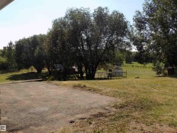 View of yard featuring a view of rural / pastoral area and a playground - 