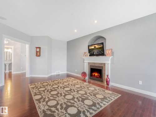 1703 33B Street, Edmonton, AB - Indoor Photo Showing Living Room With Fireplace