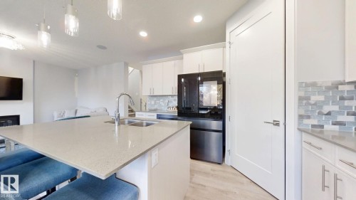 215 Glenridding Ravine Road, Edmonton, AB - Indoor Photo Showing Kitchen With Double Sink With Upgraded Kitchen