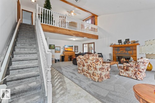 1102 13 Avenue, Cold Lake, AB - Indoor Photo Showing Other Room With Fireplace