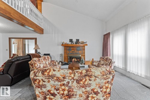 1102 13 Avenue, Cold Lake, AB - Indoor Photo Showing Other Room With Fireplace