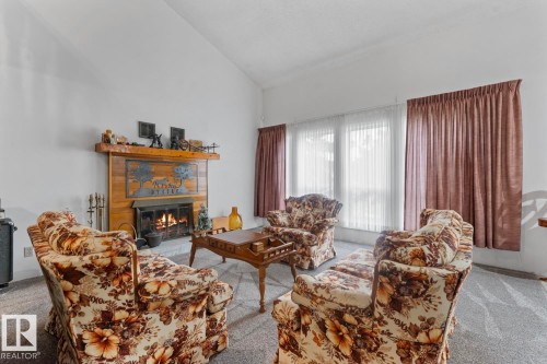 1102 13 Avenue, Cold Lake, AB - Indoor Photo Showing Living Room With Fireplace