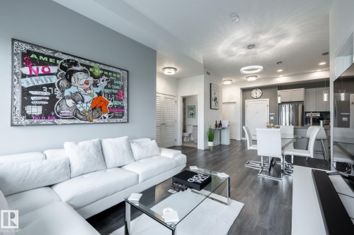 505, 1316 Windermere Wy Sw, Edmonton, AB - Indoor Photo Showing Living Room