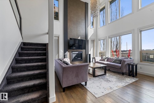 3695 Allan Drive, Edmonton, AB - Indoor Photo Showing Living Room With Fireplace