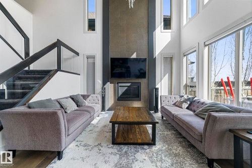3695 Allan Drive, Edmonton, AB - Indoor Photo Showing Living Room With Fireplace