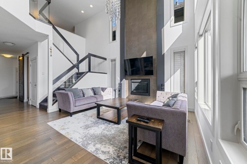 3695 Allan Drive, Edmonton, AB - Indoor Photo Showing Living Room With Fireplace