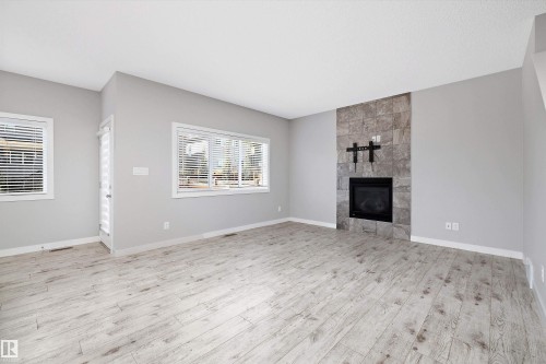 7310 Edgemont Way, Edmonton, AB - Indoor Photo Showing Living Room With Fireplace