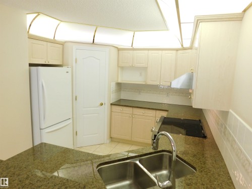 103 Falconer Court Nw, Edmonton, AB - Indoor Photo Showing Kitchen With Double Sink