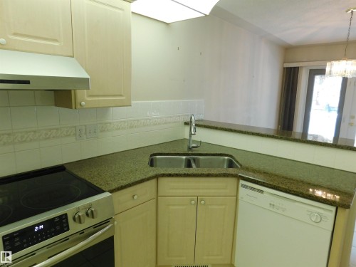 103 Falconer Court Nw, Edmonton, AB - Indoor Photo Showing Kitchen With Double Sink