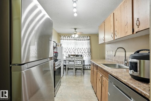 201 11046 130 Street, Edmonton, AB - Indoor Photo Showing Kitchen With Stainless Steel Kitchen