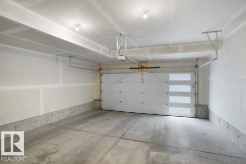 38 979 Crystallina Nera Way, Edmonton, AB - Indoor Photo Showing Garage